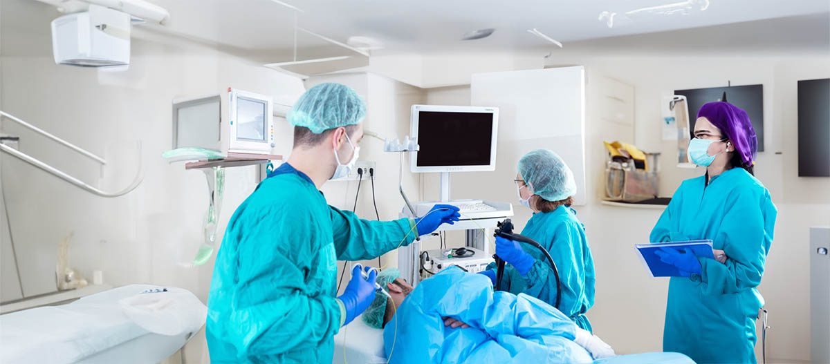 Patient getting fiber-optic gastroscopy Patient getting fiber-optic gastroscopy